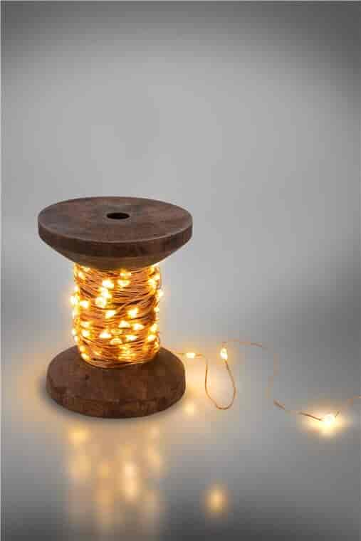 LED Light chain "Yarn spool - thread spool", 10 meters - 100 LED - 2W.LED light chain with 3 meter USB cable, light chain 10 meters with 100 micro-LEDs in warm white (2700 K) and switch (on/off). Warm white micro-LEDs create a cozy atmosphere, either as a concentrated light source on the coil or decorated as a light chain.goobay