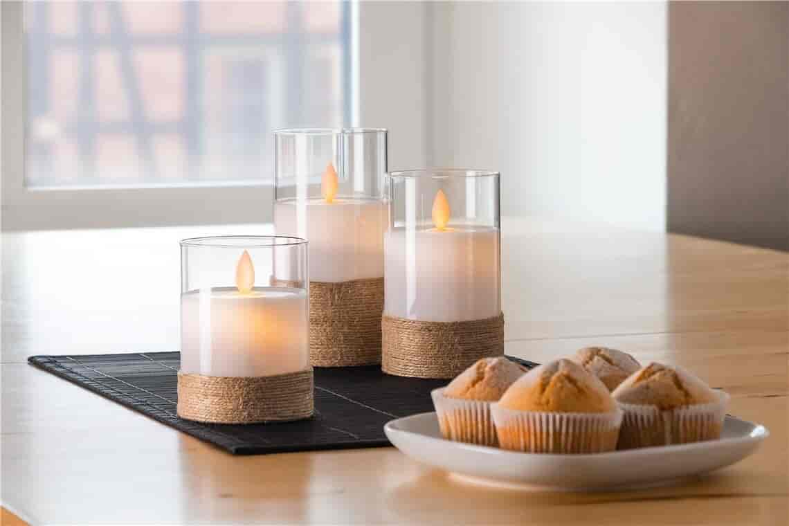 LED Wax candle in light, with a beautiful flame effect. Set with 3 heights, timer function.Beautiful LED wax candles in 3 different heights. Mounted in glass with hemp wrapping. You can quickly create beautiful, safe and cozy lighting. Used in all places where there is a need for beautiful cozy lighting. Realistic flickering flame effect with swinging wicks and natural materials create a rustic elegance. Battery operated candles are ideal as a safe decoration for living rooms, bedrooms, offices, in elderly care, restaurants or schools and spaces where open flames are not desirable or permitted. Smart timer that automatically switches the beautiful lighting on and off.goobay