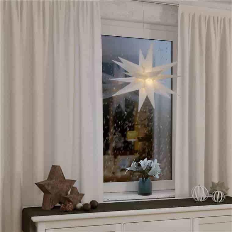 LED Christmas star 3D, Ø 56 cm, 4.5 V external transformer, indoors and outdoorsCreate a magical atmosphere in your home or outdoor area with our 3D LED poinsettia. This beautifully designed outdoor star has a diameter of 56 cm and comes with a practical 4.5-V outdoor transformer that ensures safe and reliable operation. The star is equipped with a handy timer function that allows you to set it to light up for 6 hours and then turn off automatically for 18 hours. This makes it easy to save energy and extend the lifetime of the star's LED lighting. The warm white glow with a color temperature of 3000 K creates a cozy and festive atmosphere, perfect for Christmas decorations both indoors and outdoors.goobay