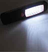 LED worklight with magnetic clamp and hanger.