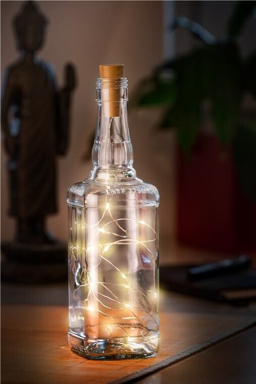 Bottle string light with 20 LEDs - warm whiteDecorative light chains with "cork"screws that provides a cozy and beautiful lighting.goobay