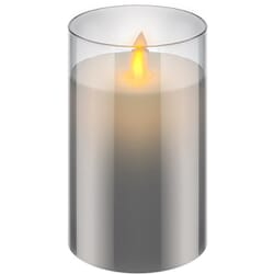 LED wax candle in glass, create cozy lighting. Living flame.