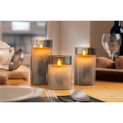 LED wax candle in glass, create cozy lighting. Living flame.Set of 3 pcs. LED light, real wax candle in glass. Beautiful and safe cozy lighting. With the new generation of LED wax candles, you can create a perfect cozy atmosphere. Warm white LED wax candle with candle flame - hard to distinguish from real candles - in beautiful gray tinted glass. Built-in timer (automatically on 6 hours / off 18 hours). No fire hazard and no smoke particles in the air.goobay